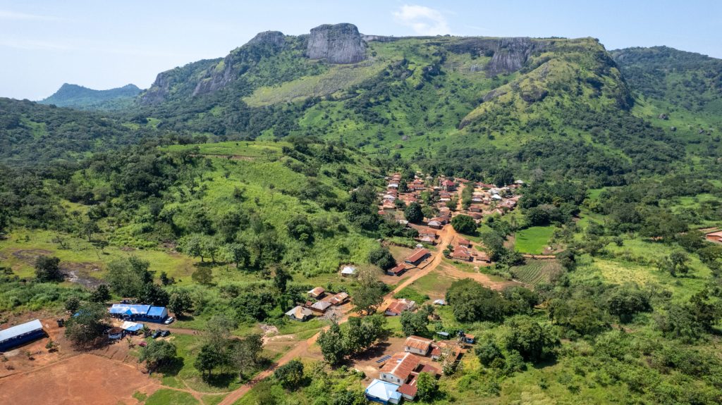 Aerial view of a rural Sierra Leone community served by Schools for Salone.
